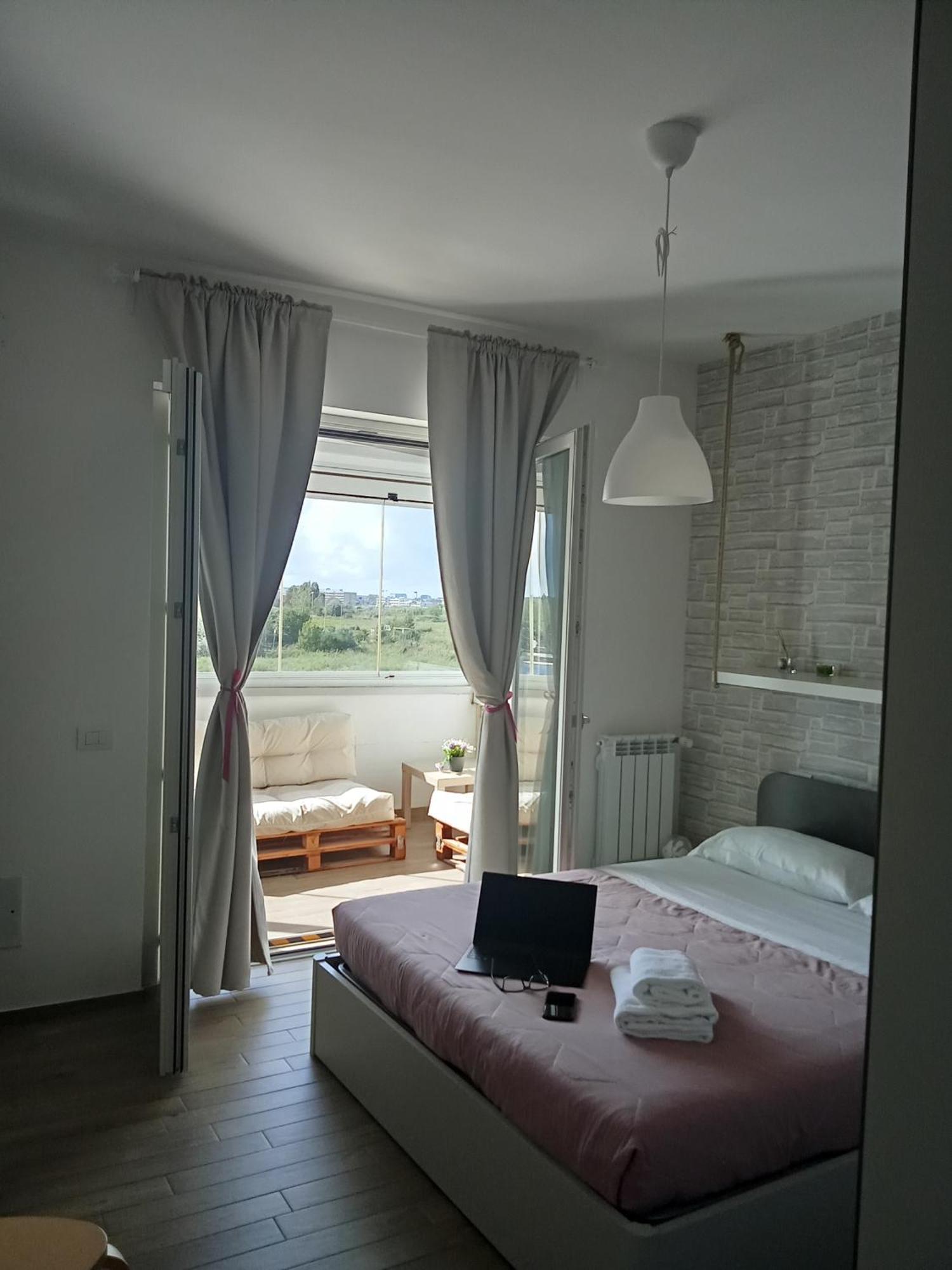 Residenze Ohana Фьюмичино Экстерьер фото